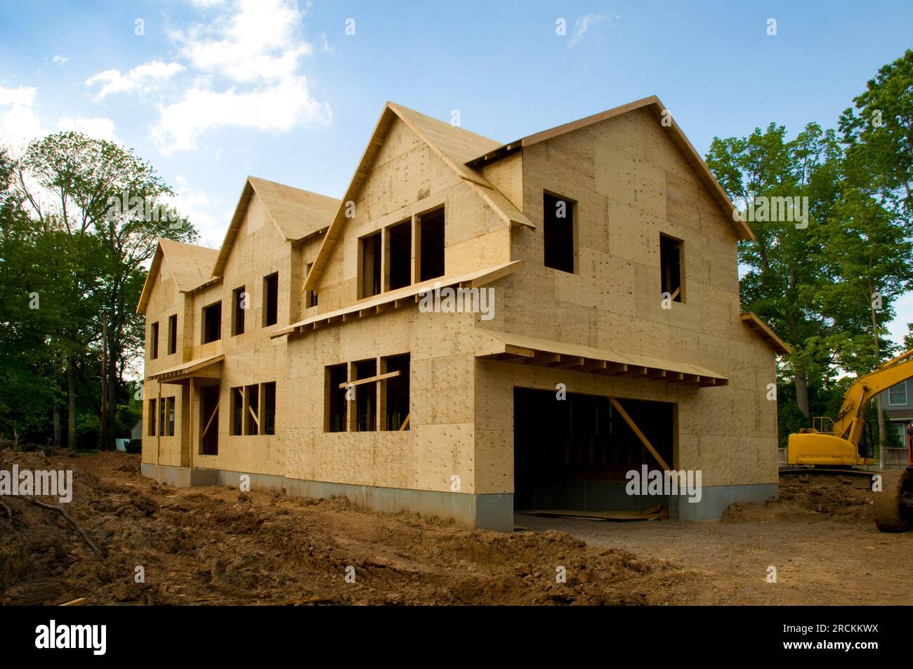 Large suburban house under construction in the sheathing phase. Stock Photo