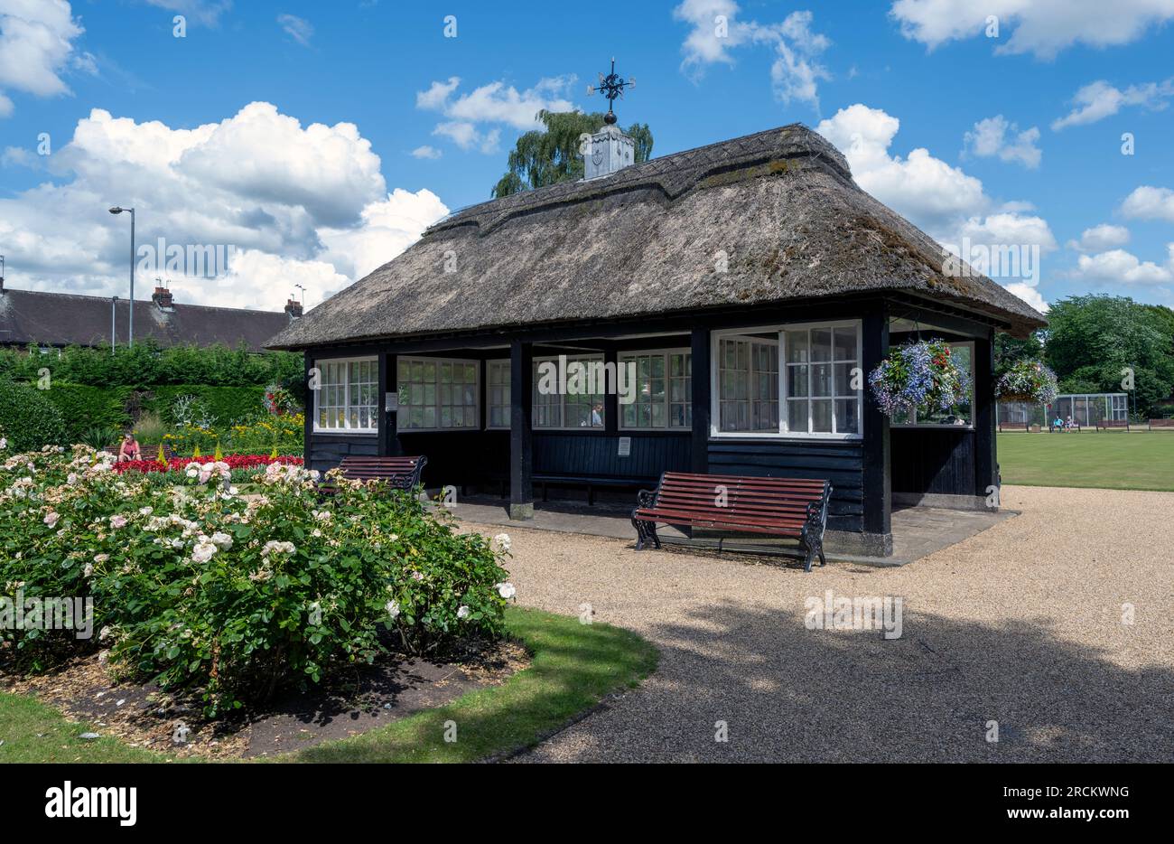 Bowls Pavilion with thatched roof in Victoria Park, Stafford, Staffordshire, England, UK Stock Photo
