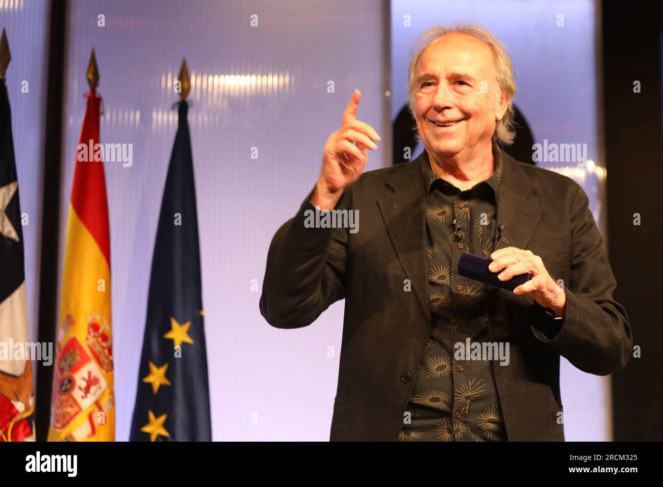Madrid, Spain. 15th July, 2023. Madrid, Spain. 15th July, 2023. The Catalan singer-songwriter Joan Manuel Serrat greets the public during the event. Taking advantage of the visit to Madrid of the President of the Republic of Chile. Gabriel Boric, Casa de América and the Chilean embassy in Madrid have organized an act in commemoration of the next 50th anniversary of the coup d'état in the South American country called: 'Memory and future 50 years after the coup d'état'. Coup led by General Augusto Pinochet against President Salvador Allende. Stock Photo