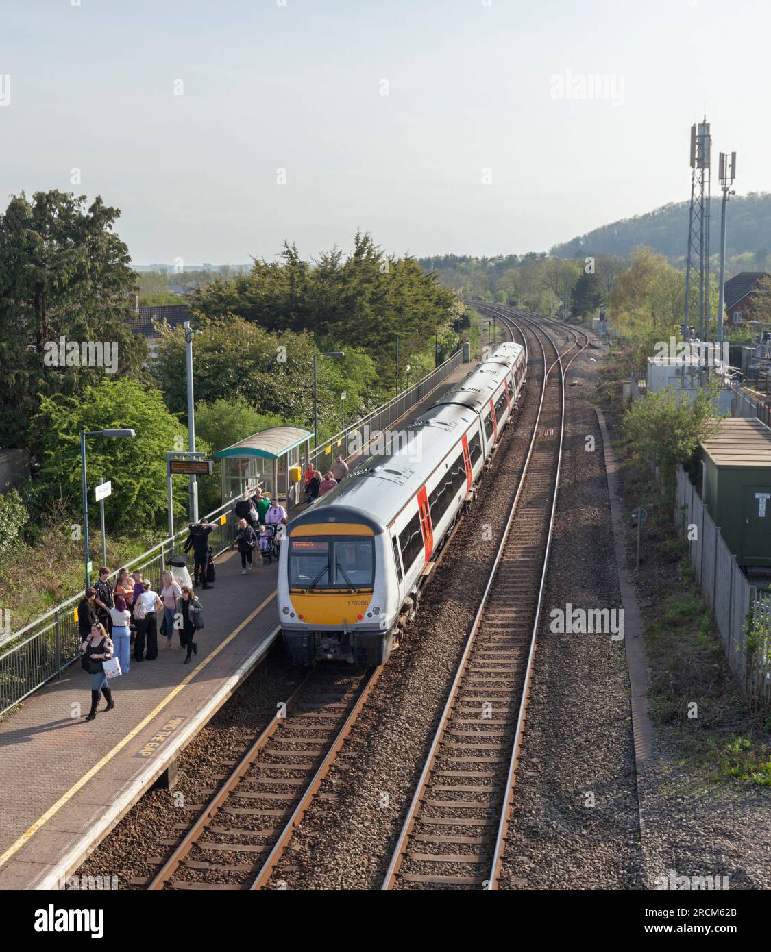 Transport For Wales class 170 Alstom Turbostar  DMU train 170206 calling at  Pencoed railway station with passengers leaving the train Stock Photo