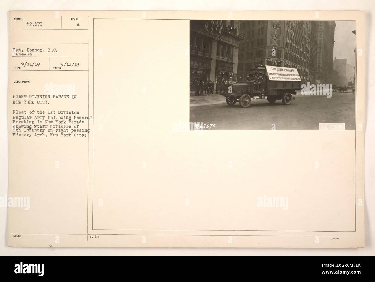 Parade in New York City featuring the 1st Division of the Regular Army. General Pershing leads the parade, followed by a float showing staff officers of the 6th Infantry Regiment passing Victory Arch. Photograph taken by Sgt. Bonner, S.C., on September 11, 1919. Issued symbol A 9/10/19. Stock Photo