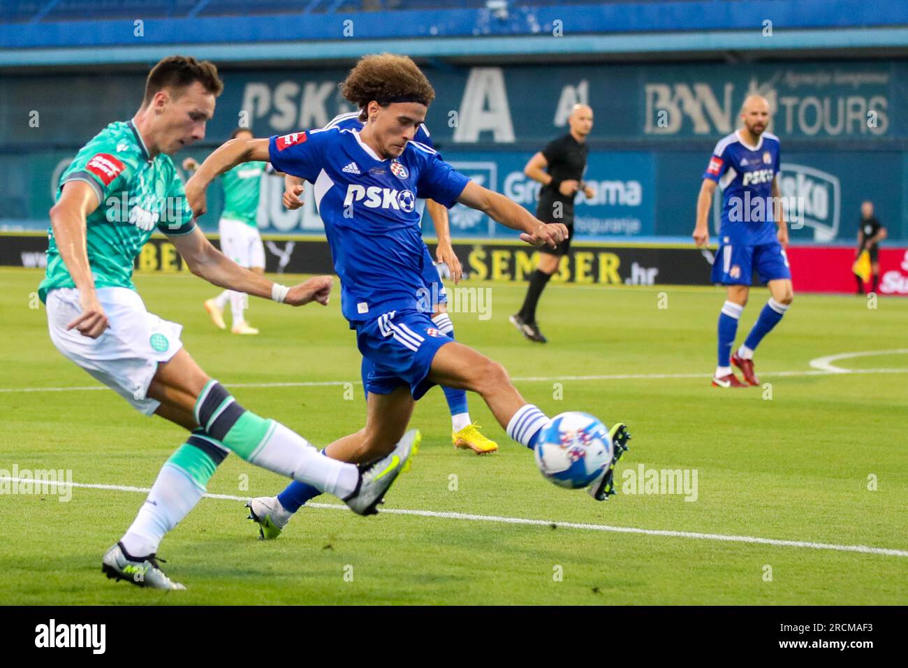 Zagreb, Croatia. 15th July, 2023. Jan Mlakar of Hajduk Split and Fran Topic  of Dinamo Zagreb in action during the Supersport Supercup match between GNK  Dinamo Zagreb and HNK Hajduk Split at