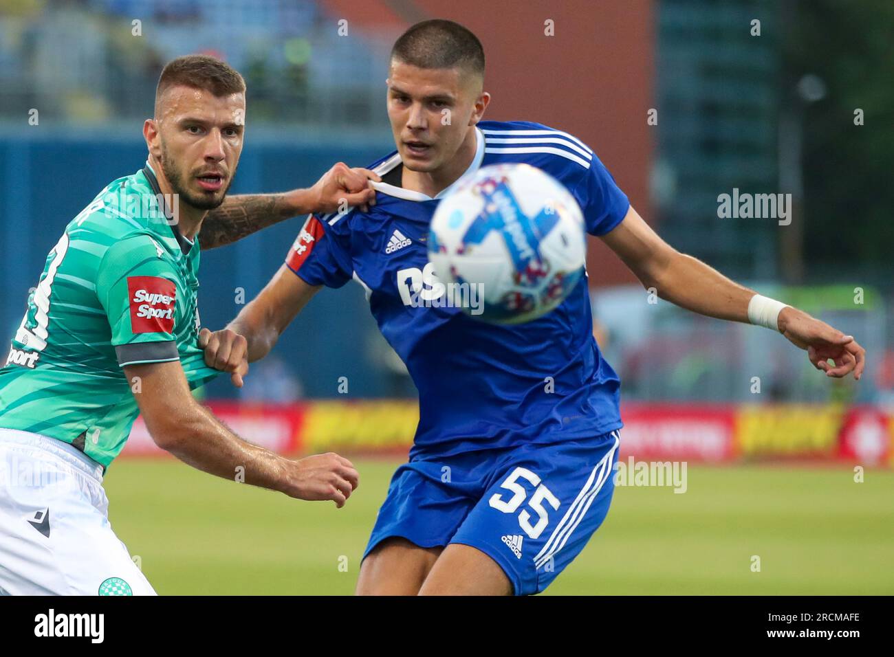 Zagreb, Croatia. 15th July, 2023. Jan Mlakar of Hajduk Split and Fran Topic  of Dinamo Zagreb in action during the Supersport Supercup match between GNK Dinamo  Zagreb and HNK Hajduk Split at