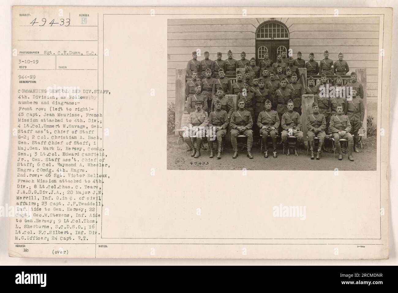 Caption: Commanding General and Division Staff of the 4th Division during World War One. Photograph taken by Sgt. C.E. Dunn on March 10, 1919. Front row (left to right): Capt. Jean Meurisse, Lt. Col. Emmeret W. Savage, Col. Christian A. Bach, Maj. Gen. Mark L. Hersey, Lt. Col. Edward Camfield Jr., Col. Raymond A. Wheeler. Second row: Sgt. Victor Belloux, Lt. Col. Chas. C. Teare, Major J.N. Merrill, Capt. J.P. Twaddell, Capt. Geo.M. Stevens, Lt. Col. Thos L. Sherburne, Lt. Col. F.C. Silbert, Capt. R.T. Stock Photo