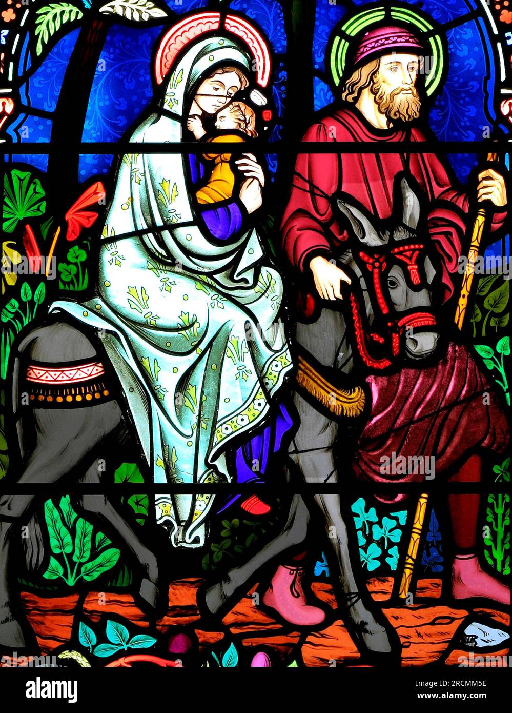 Flight to Egypt, Joseph, Mary, baby Jesus, escape slaughter of new born males, stained glass window, by Frederick Preedy, 1865, Gunthorpe, Norfolk Stock Photo