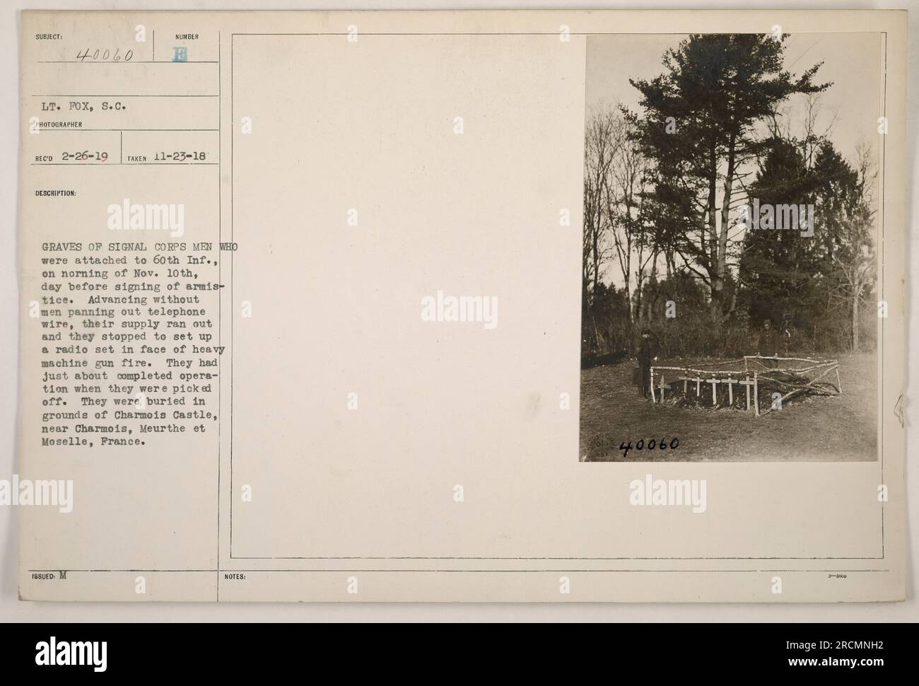 Graves of Signal Corps men attached to the 60th Infantry captured in Lieutenant Fox's photograph. On November 10th, the men ran out of telephone wire while advancing and were forced to halt their progress amidst heavy machine gun fire. They were setting up a radio set when they were shot and killed. Their bodies were laid to rest at Charmois Castle grounds, near Charmois, Meurthe et Moselle, France. Stock Photo