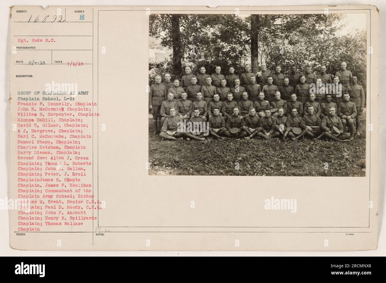 This photograph, numbered 111-SC-16892 SIL!ww1/war, features a group of chaplains at the Army Chaplain School during World War One. In the photo, from left to right in the front row, are Francis F. Donnelly, John B. McCormick, William S. Carpenter, Alonso Cahill, David T. Gilmor, A J. Hargrove, Earl C. McConnaha, Samuel Stapp, Charles Ketcham, and Harry Dieman. In the second row, there are Allen J. Green, Thomas L. Roberts, John A. Gallon, Peter J. Eroll, James R. Shantz, James P. Houlihan, Commandant of the Chaplain Army School, Bishop Charles M. Brent, Paul D. Moody, John P. Anshutt, Henry R Stock Photo