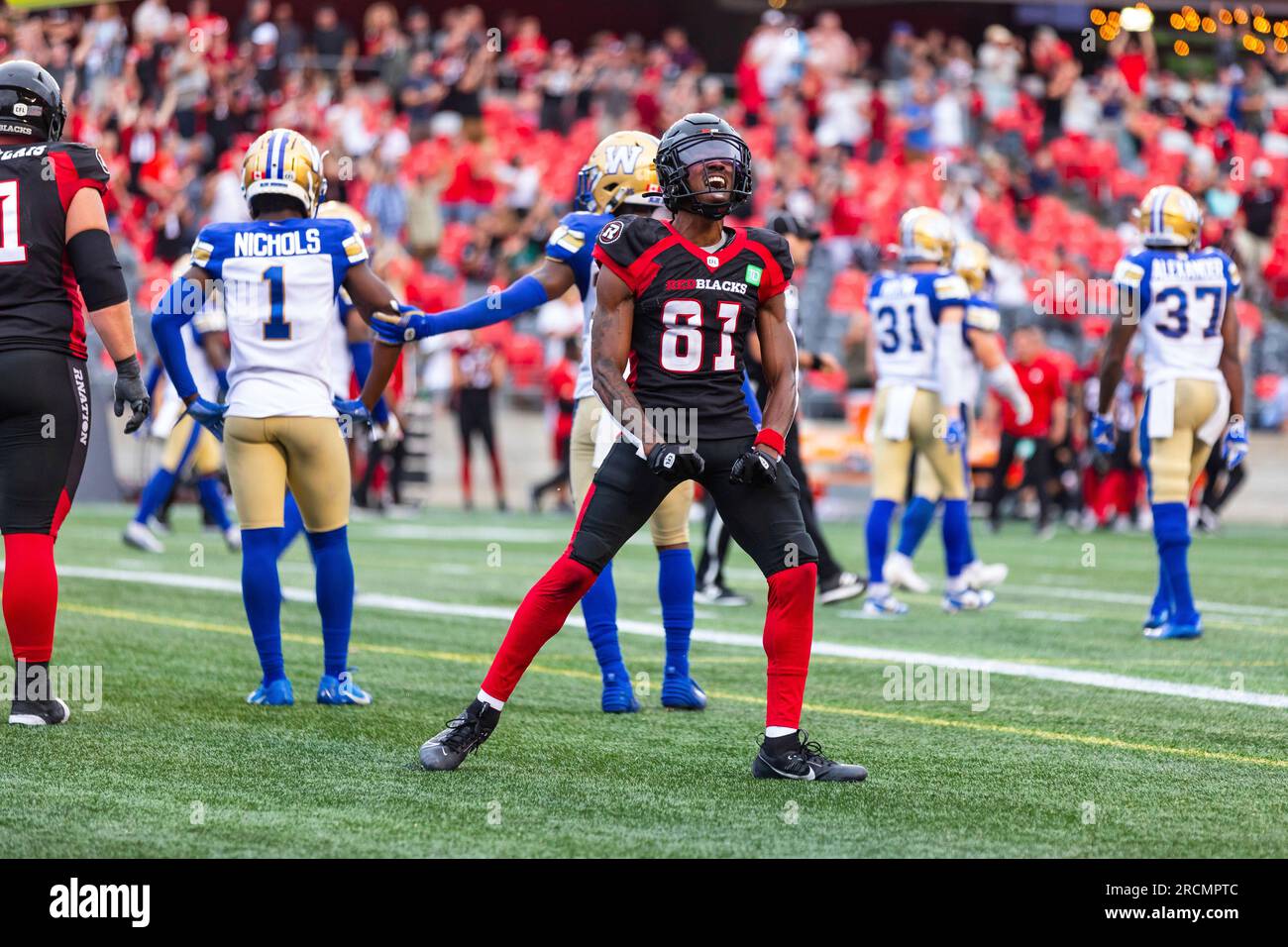 OTTAWA, ON - JULY 15: Ottawa Redblacks wide receiver Savon Scarver (81)  celebrates the two point conversion with teammates during Canadian Football  League action between the Winnipeg Blue Bombers and Ottawa Redblacks