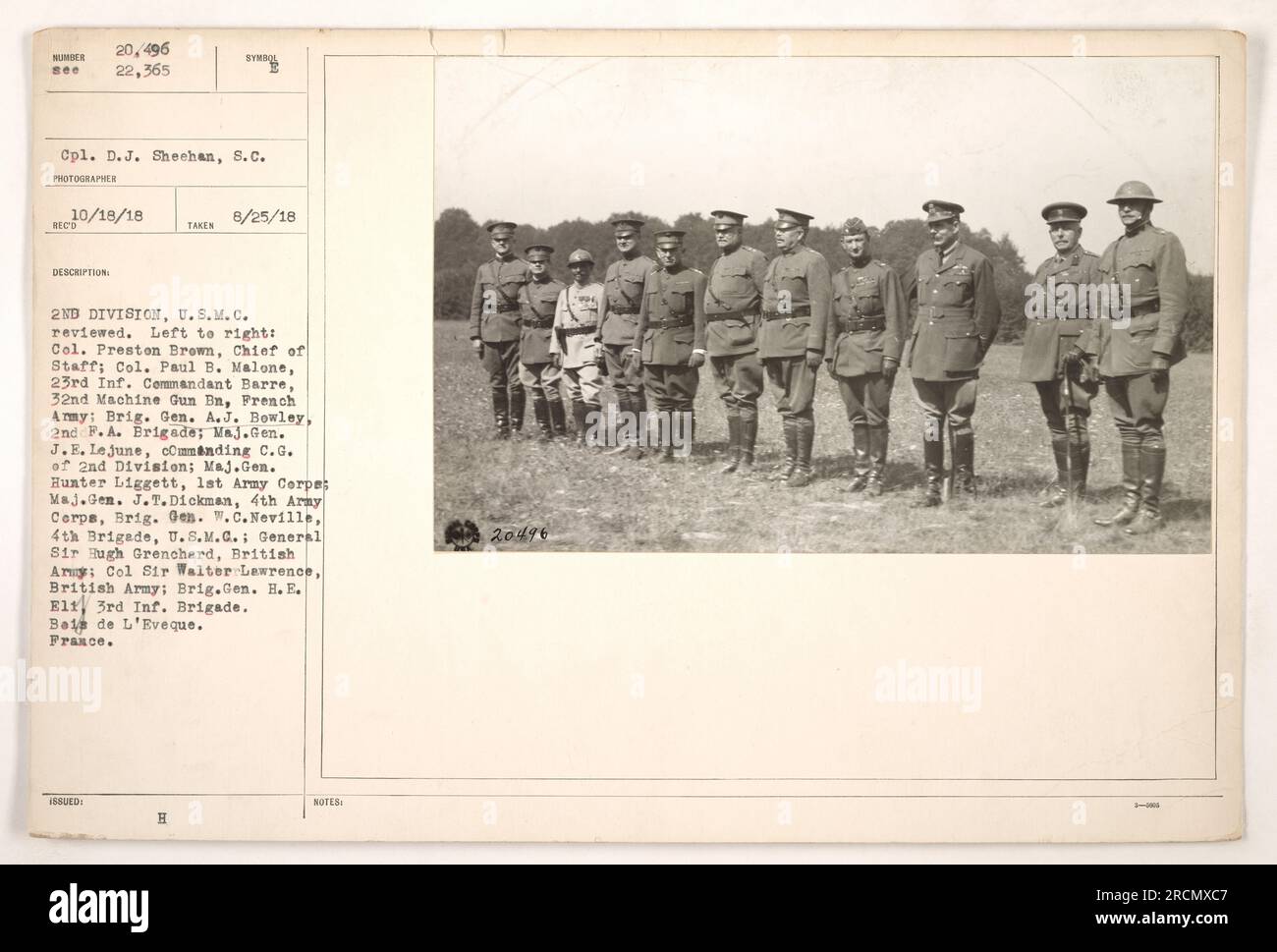 Senior military officials from various divisions and armies pose for a group photograph in Bois de L'Eveque, France. The photograph was taken on August 25, 1918, and received on October 18, 1918. Among those present are Col. Preston Brown, Col. Paul B. Malone, Brig. Gen. A.J. Bowley, Maj. Gen. J.E. Le june, Maj. Gen. Hunter Liggett, Maj. Gen. J.T.Dickman, Brig. Gen. W.C.Neville, General Sir Hugh Grenchard, Col. Sir Walter Lawrence, and Brig. Gen. H. E. Elt. The photograph is part of the collection of photographs documenting American military activities during World War One. Stock Photo