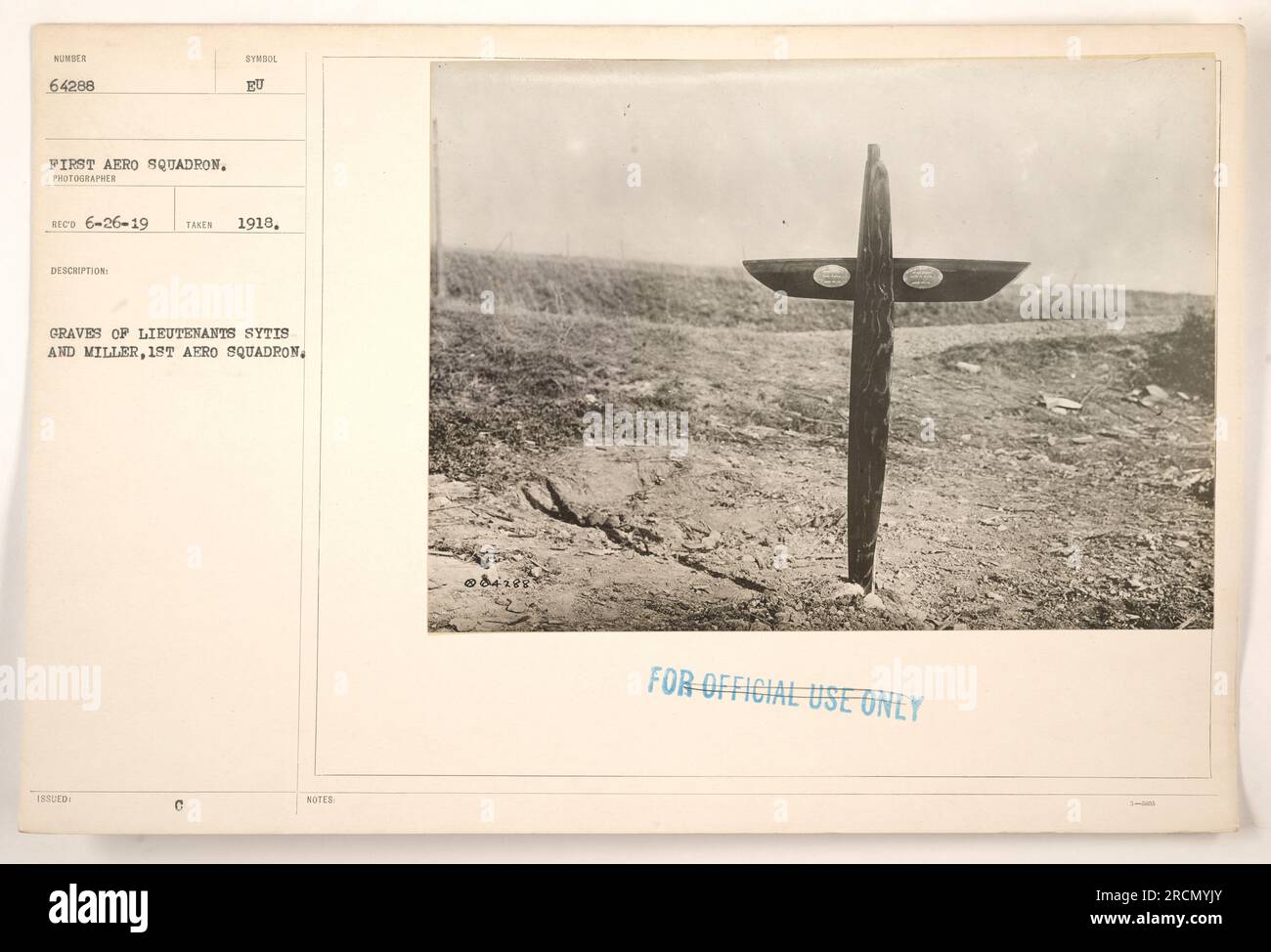 Grave of Lieutenants Sytis and Miller, 1st Aero Squadron, numbered 64288. This photograph, taken in 1918, shows the graves of Lieutenants Sytis and Miller, members of the 1st Aero Squadron. The photographer is RECO, with this image issued in 6-26-19 EU. Note: this image is intended for official use only. Stock Photo