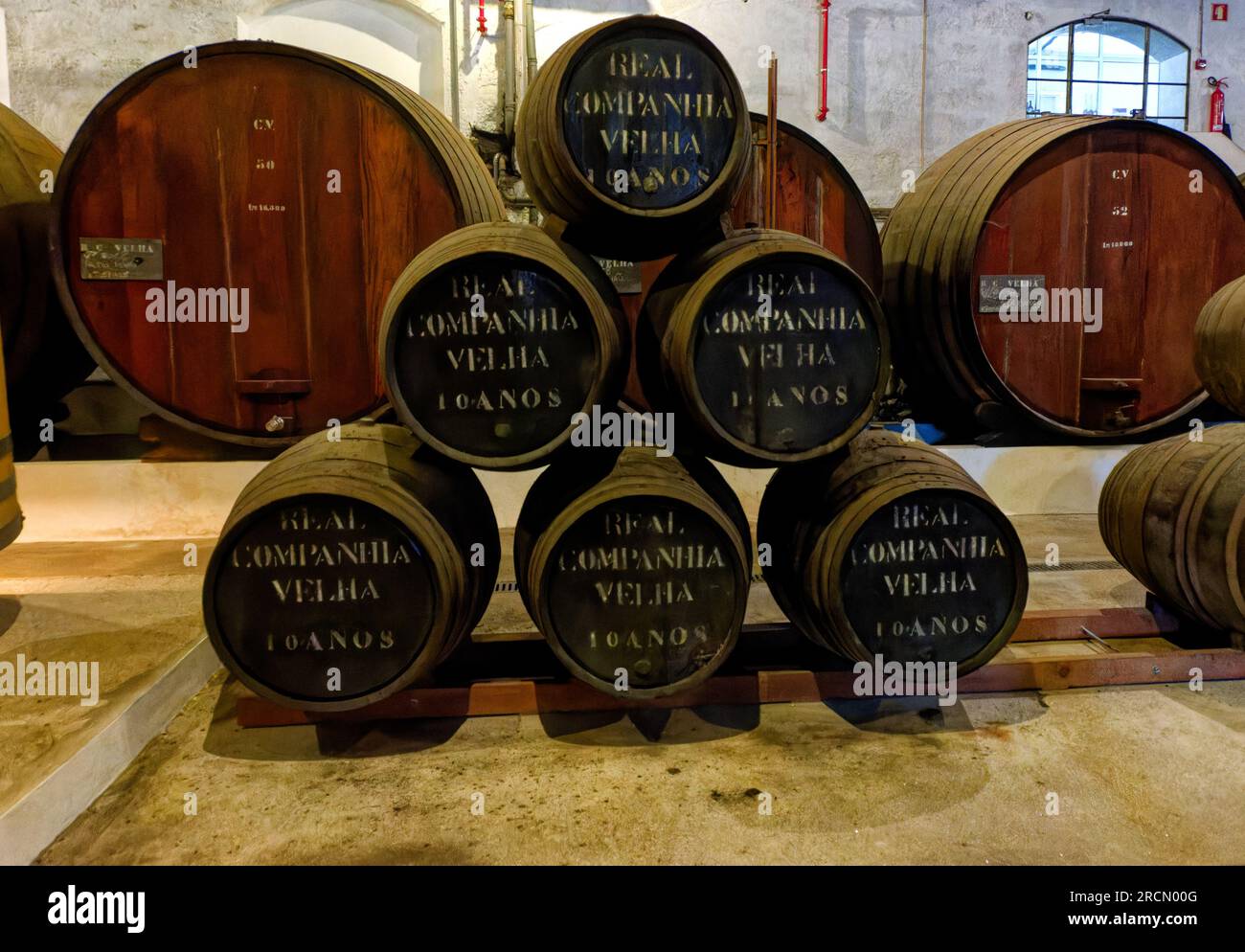 Real Companhia Velha, casks of 10 year old port in their cellar, Porto, Portugal. Stock Photo