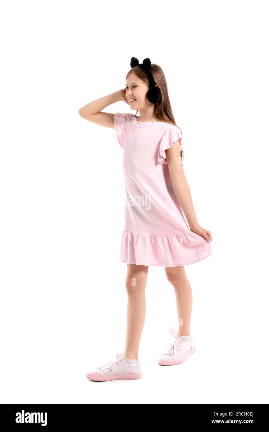 Little girl in cute headphones on white background Stock Photo - Alamy