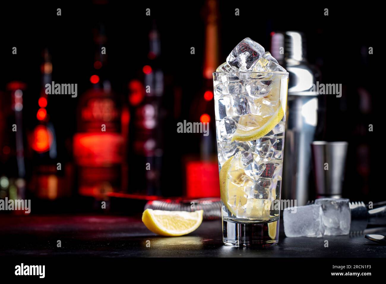 Vodka tonic alcoholic cocktail drink with cold vodka, lemon juice