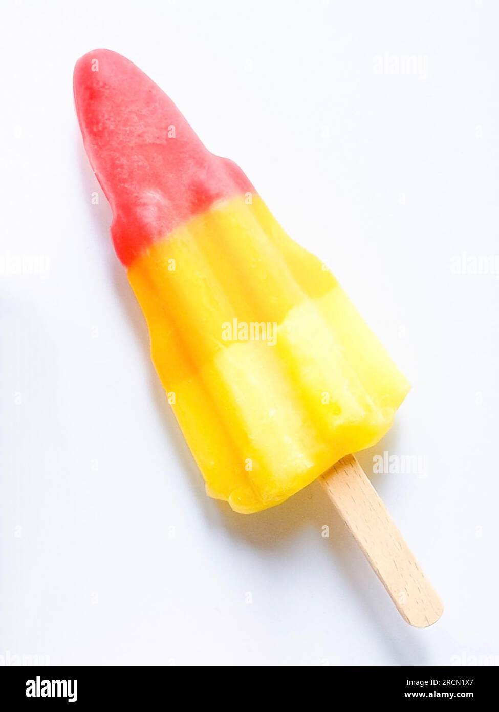 Colourful Rocket ice lolly on a white background.  Summer treat for hot weather Stock Photo