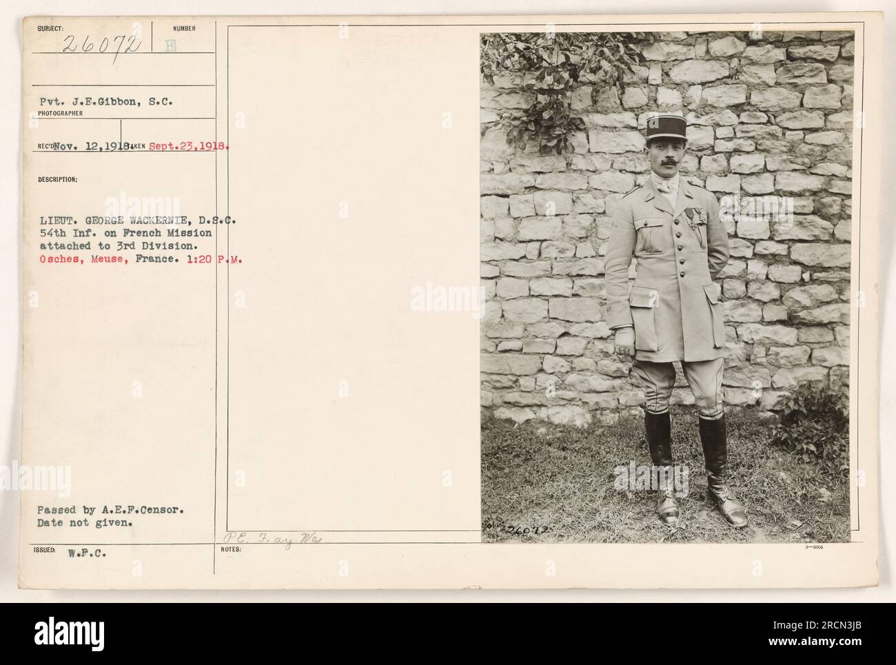 Lieutenant George Wackernie, recipient of the Distinguished Service Cross, and member of the 54th Infantry, is pictured here on his French Mission attached to the 3rd Division. The photograph was taken in Osches, Meuse, France. The specific date of the photo is not given, but it was approved and passed by A.E.F. (American Expeditionary Forces) Censor and issued by W.P.C. (War Department Publicity Committee). Stock Photo