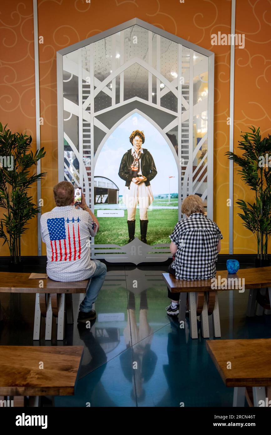 Atchison, Kansas. Amelia Earhart hangar museum  People check out an exhibit at the museum. Stock Photo