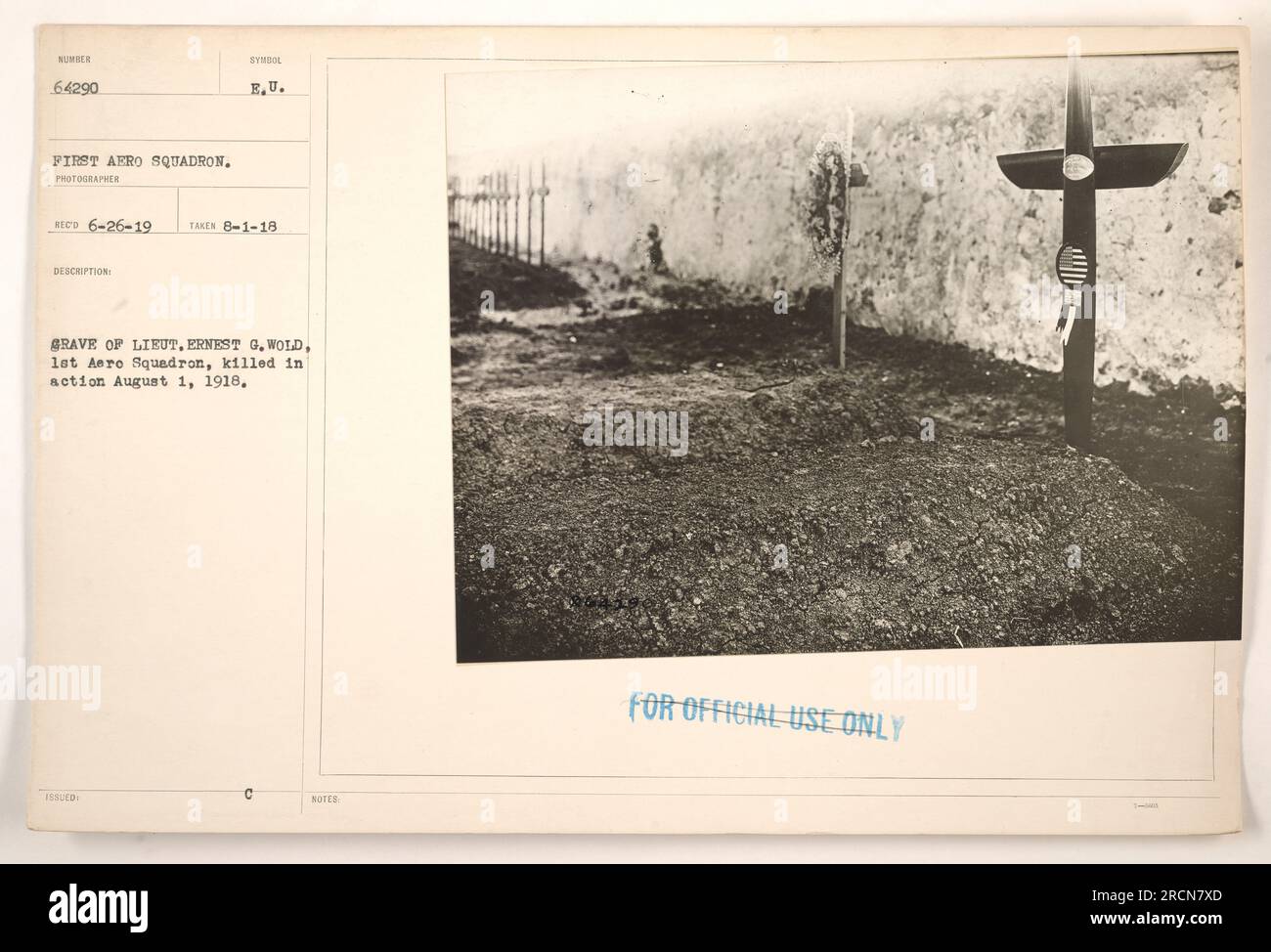 Grave of Lieutenant Ernest G. Wold, member of the 1st Aero Squadron who was killed in action on August 1, 1918. The photograph was taken on August 1, 1918 and is marked with the symbol 'RECO 6-26-19.' European Union issued grave. Notes on the photograph are marked as 'For Official Use Only.' Stock Photo