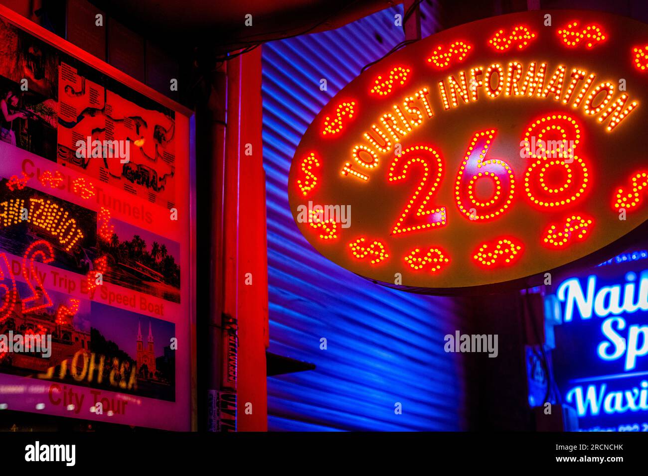 Neon lights at night on the sidewalk in Saigon Stock Photo Alamy