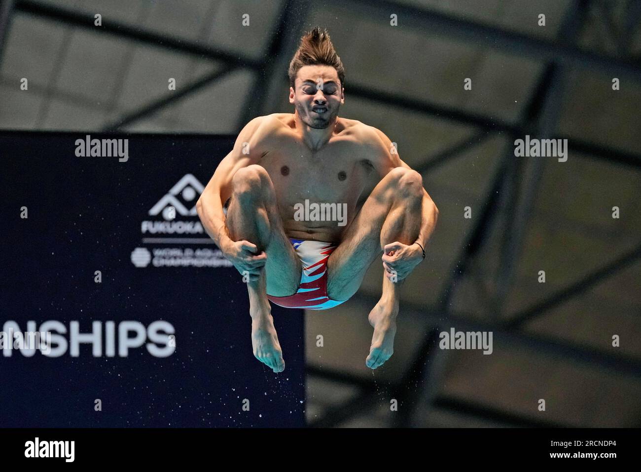 Jules Bouyer of France competes during the men's 1m springboard diving ...