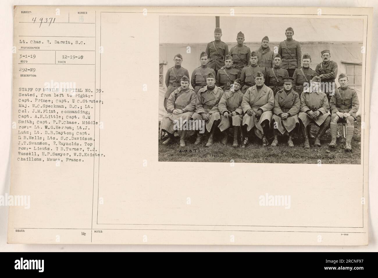 Seated in the photograph are Capt. Prince, Capt. E.C. Struter, Maj. W.C. Speckman, D.C., Lt. Col. J.M. Flint, Capt. A.H. Little, Capt. G.M. Smith, and Capt. P.P. Chase. In the middle row are Lt. W.H. Herron, Lt. J. Lutz, Lt. B.B. Dayton, Capt. D.B. Wells, Lts. S.C. Davidson, J.T. Swanson, and R. Reynolds. Top row consists of Lieuts. R.B. Turner, T.J. Russell, H.P. Sawyer, and W.S. Keister. The location is Chaillons, Meuse, France. Note: The caption is a replication of the text provided by the user. However, some words and abbreviations were indistinguishable or incomplete, resulting in inconsi Stock Photo