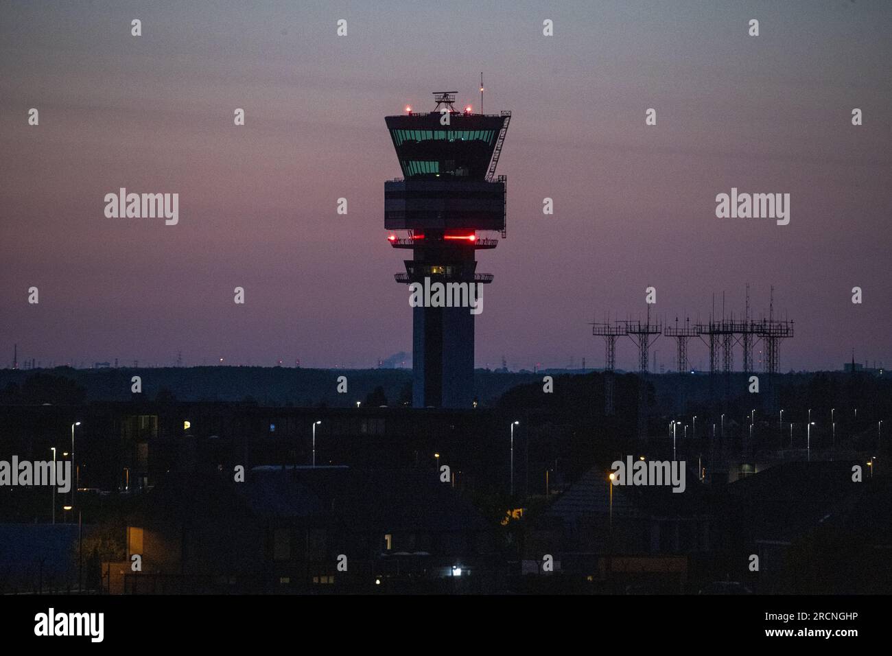 Steenokkerzeel, Belgium. 15th July, 2023. Illustration picture shows the control tower at Brussels Airport by night, in Zaventem, Saturday 15 July 2023. Federal Minister of Mobility Gilkinet (Ecolo) presented a draft ministerial decree to limit noise nuisance for residents living near the internatinoal airport, this week. A striking measure is a total ban on night flights from 11 p.m. and 6 a.m. BELGA PHOTO NICOLAS MAETERLINCK Credit: Belga News Agency/Alamy Live News Stock Photo