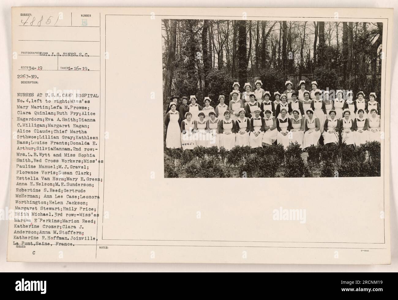 'Nurses at U.S.A. Camp Hospital No. 4, Joinville, La Pont, Seine, France. The photograph, taken on 16-19, shows the nurses organized in rows. In the front row, from left to right, are Miss'es Mary Martin, Lefa M. Prowse, Clara Quinlan, Ruth Pry, Alice Hagerdorn, Eva A. Smith, Diana C. Milligan, Margaret Eagan, Alice Claude, Chief Martha Orthwoe, Lillian Gray, Kathleen Bass, Louise Prants, Donalda E. Arthur, and Sylvia Hannam. In the second row are Mrs. L.B. Wytt and Miss Sophia Smith, Red Cross Workers, along with more nurses. The third row includes more nurses. The photo was issued with the n Stock Photo