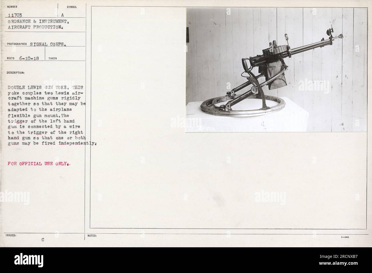A yoke coupling two Lewis aircraft machine guns together for use in the