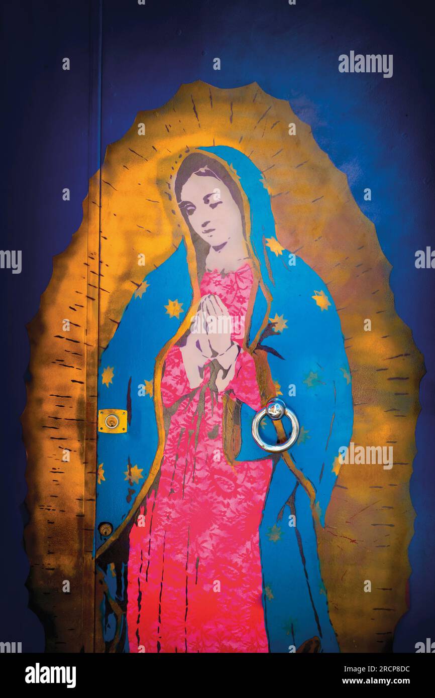 Cordoba, Cordoba Province, Andalusia, southern Spain.  Painting of the Virgin Mary on the door of a house in Calle Amparo. Stock Photo