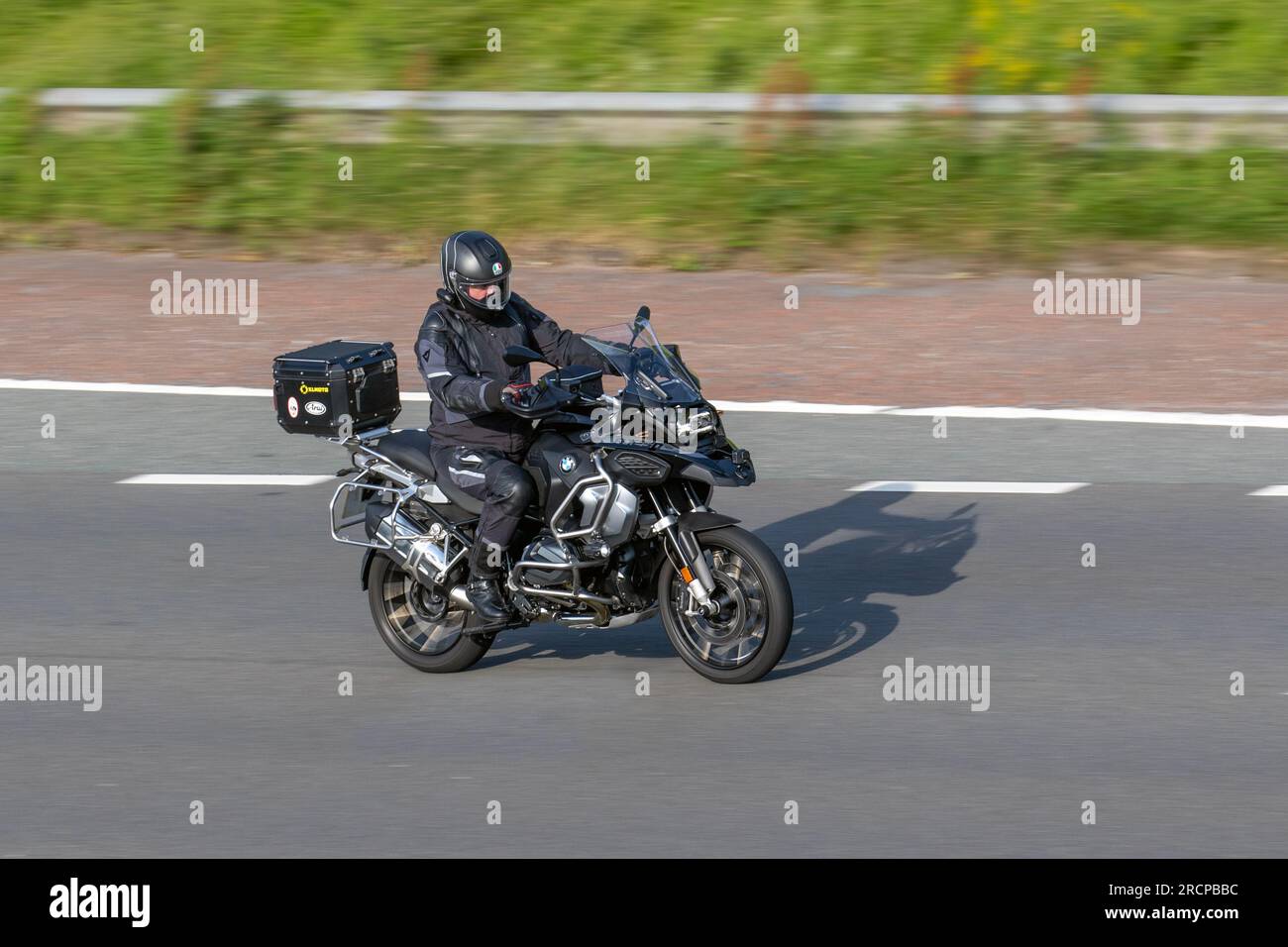 BMW R1250 Motorcycle; travelling at speed on the M6 motorway in Greater ...