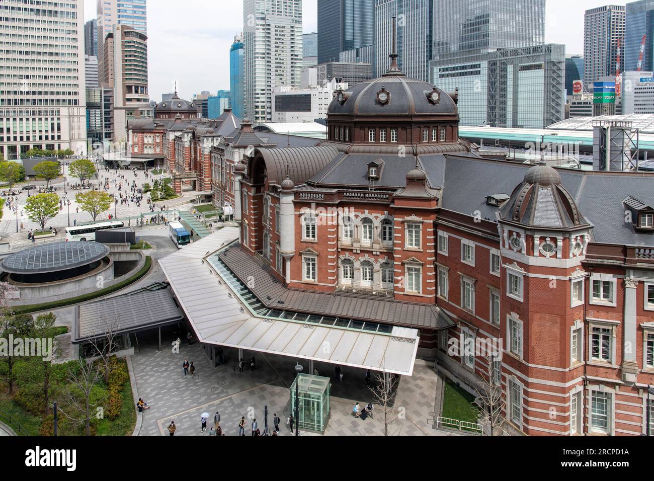 Tokyo, Japan-April 2023; High angle view of the South Entrance of Tokyo Station on the Marunouchi side with Marunouchi Ekimae square Stock Photo