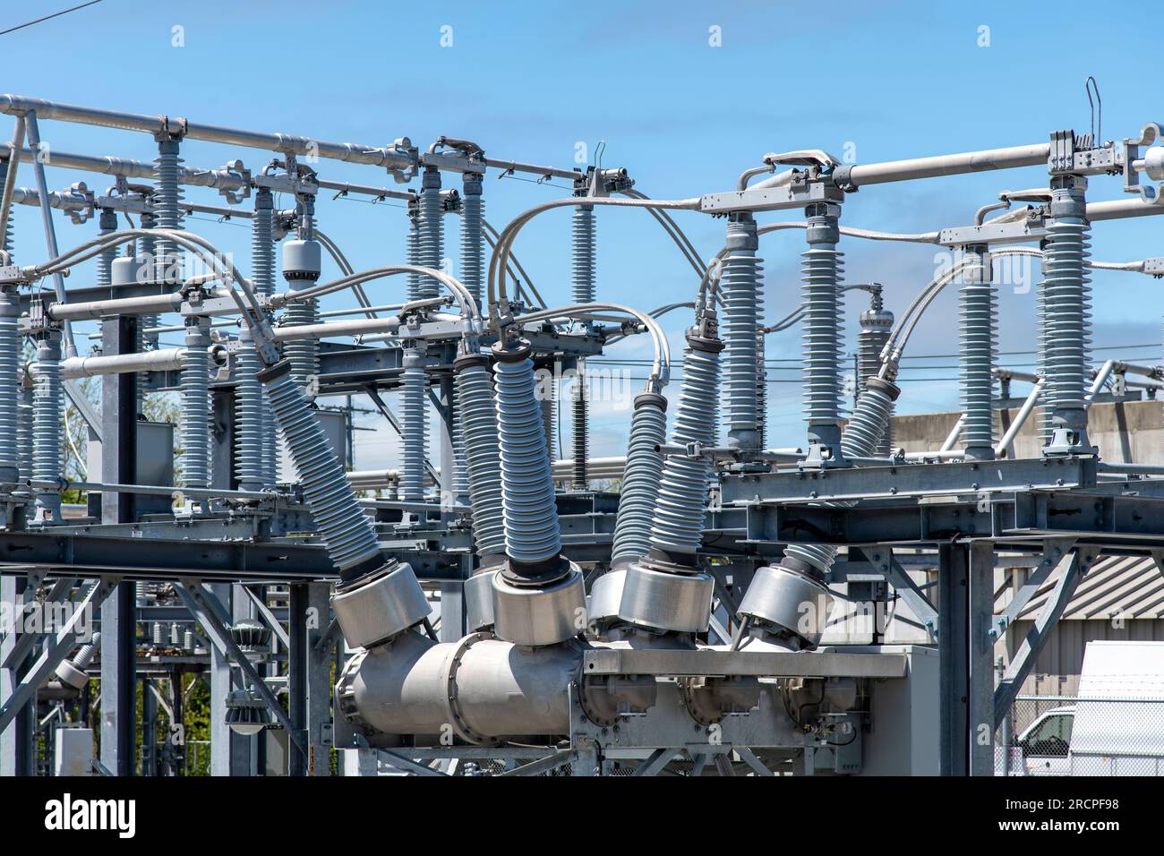 Close up view of some highvoltage bushings on a utility transformer at