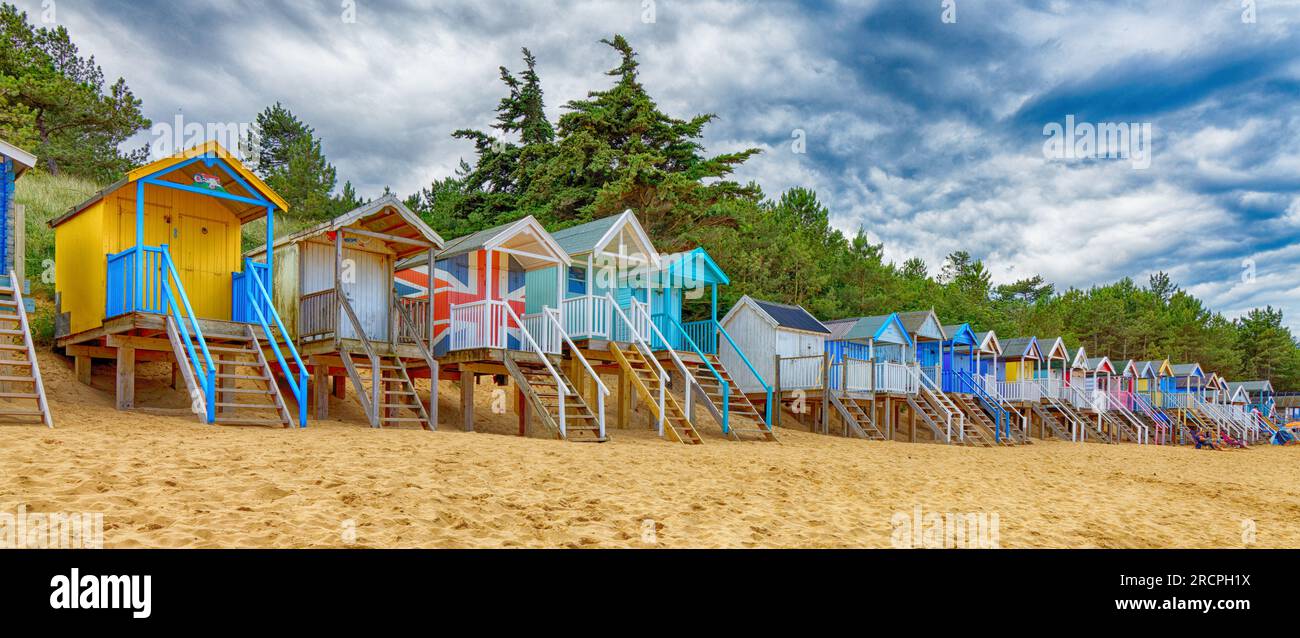 Beach Huts on stilts on Wells Beach Next-the-sea North Norfolk England UK Stock Photo