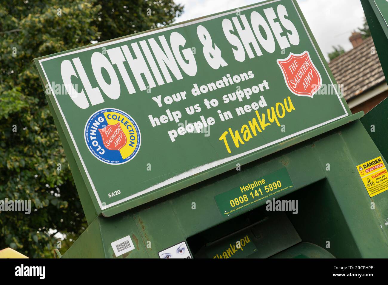 Salvation Army clothing and shoe collection banks for donations of unwanted clothes to charity, Hook, England. Concept: giving to charity Stock Photo