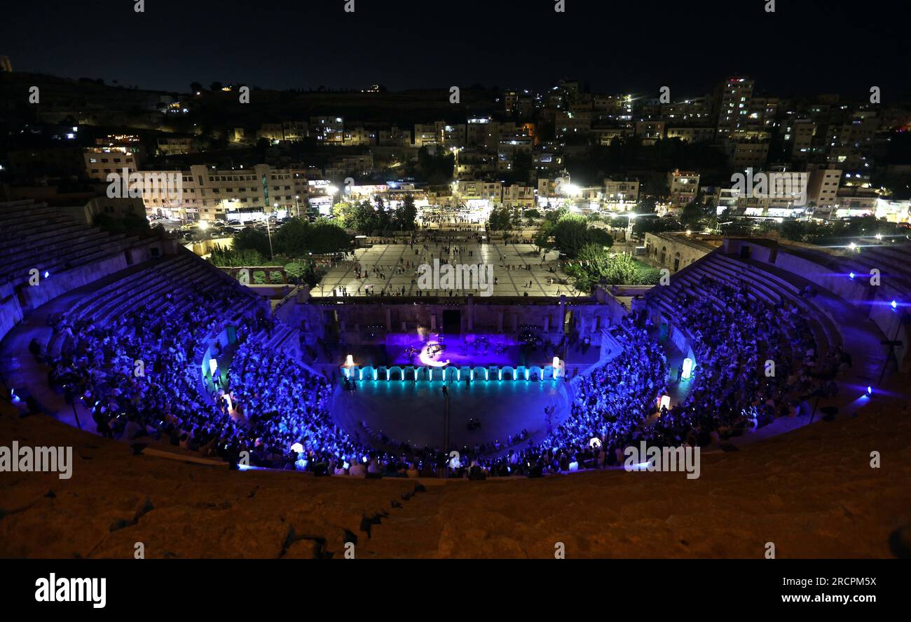 Amman, Jordan. 15th July, 2023. People attend a concert at the