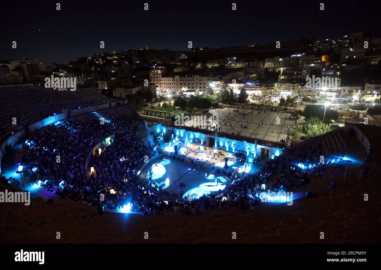 Amman, Jordan. 15th July, 2023. People attend a concert at the