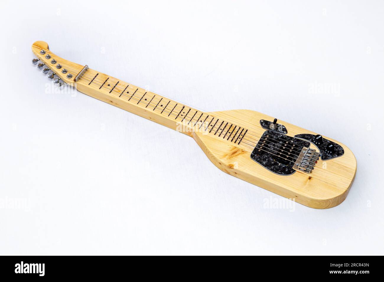 A home made lapsteel guitar with single coil and humbucker pickups