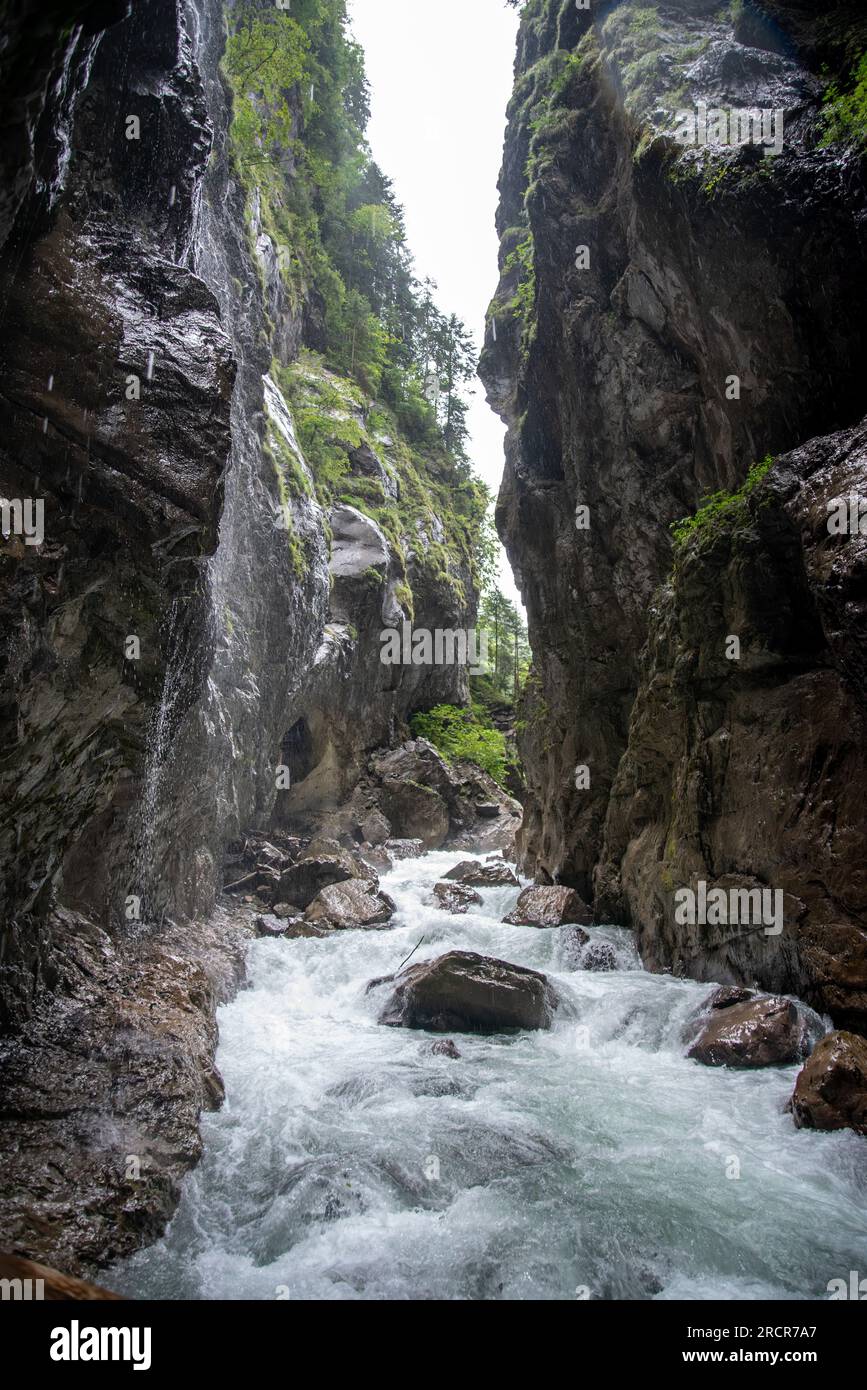 Hiking through the scenic Partnach gorge near Garmisch-Partenkirchen in ...