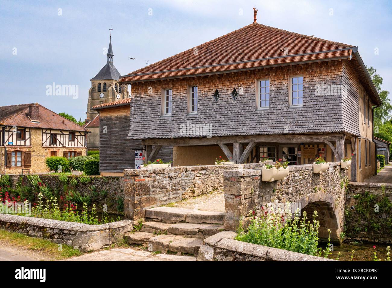 The bridge Pont Henri IV and a traditional house at th La Laines river. Stock Photo