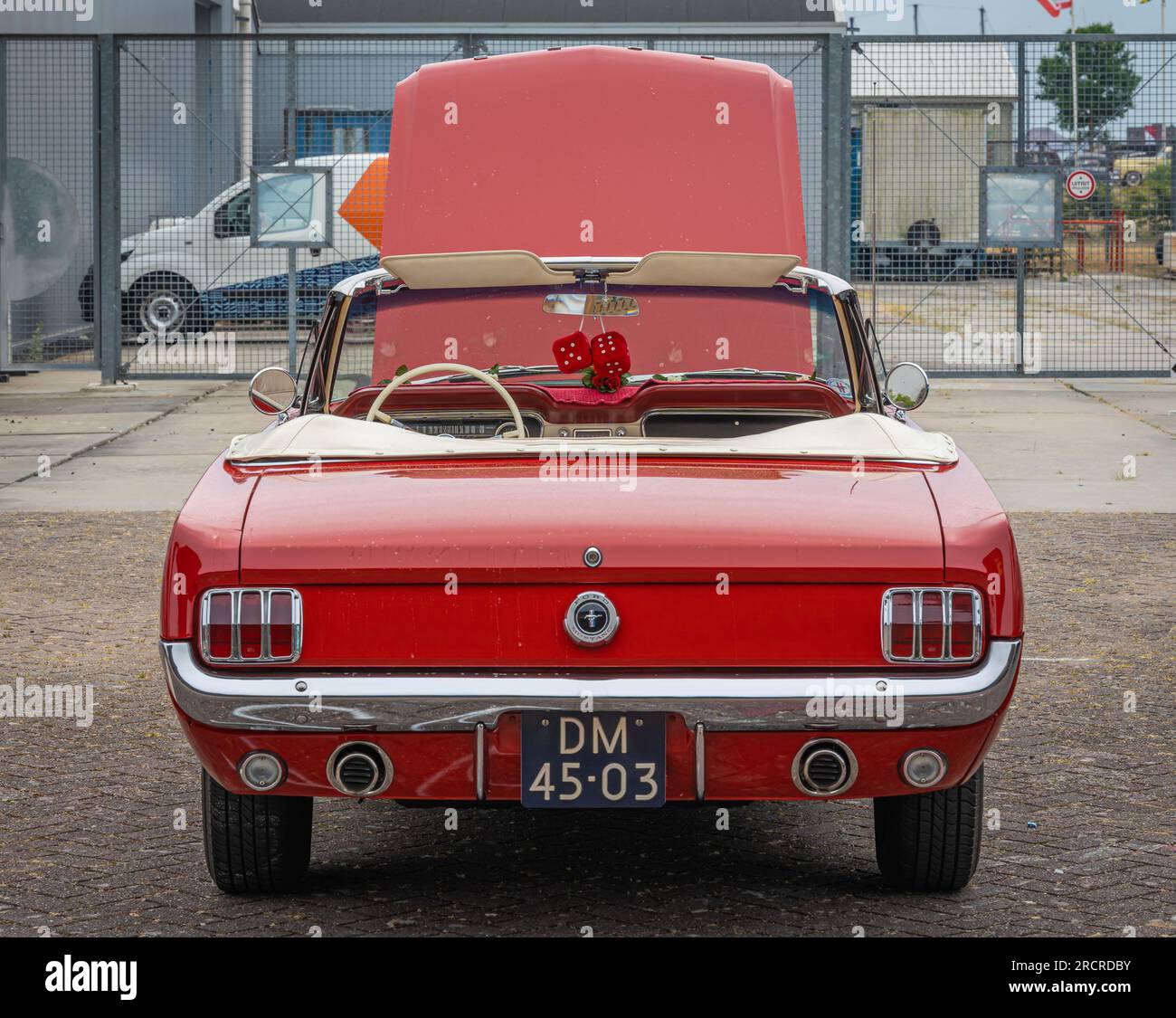 Lelystad, The Netherlands, 18.06.2023, Rear view of classic american muscle car Ford Mustang convertible from 1964 at The National Oldtimer Day Stock Photo