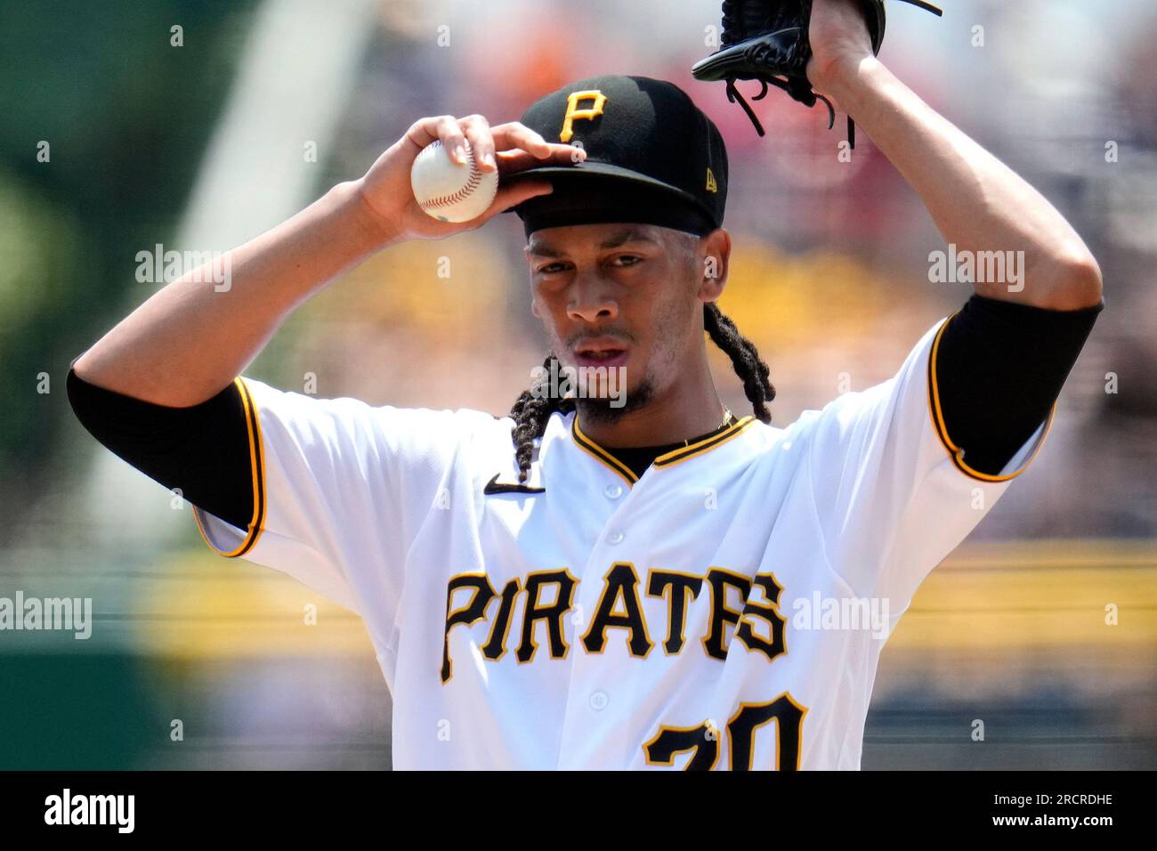 Pittsburgh Pirates starting pitcher Osvaldo Bido adjusts his cap between  hitters during the first inning of a baseball game against the San  Francisco Giants in Pittsburgh, Sunday, July 16, 2023. (AP Photo/Gene