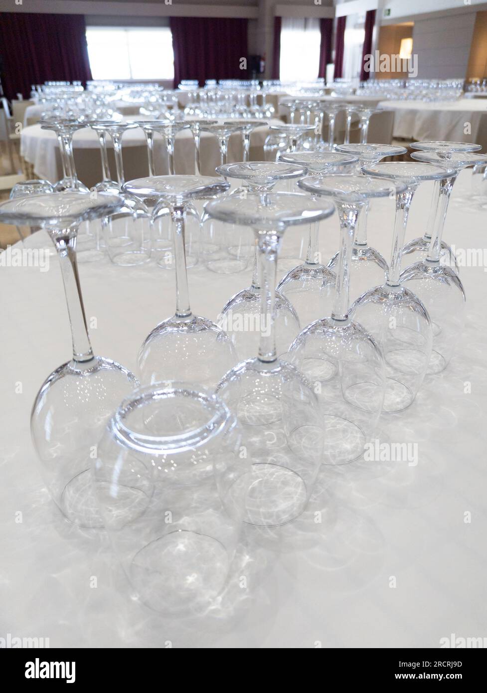 Elevate the Dining Experience: Artfully Arranged Table with Abundant Empty Wine Glasses, Symbolizing Celebration and Fine Wine Culture Stock Photo