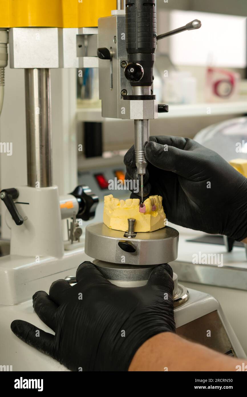 Manufacturing of dental crowns and dentures. Crown milling on High precision milling machine