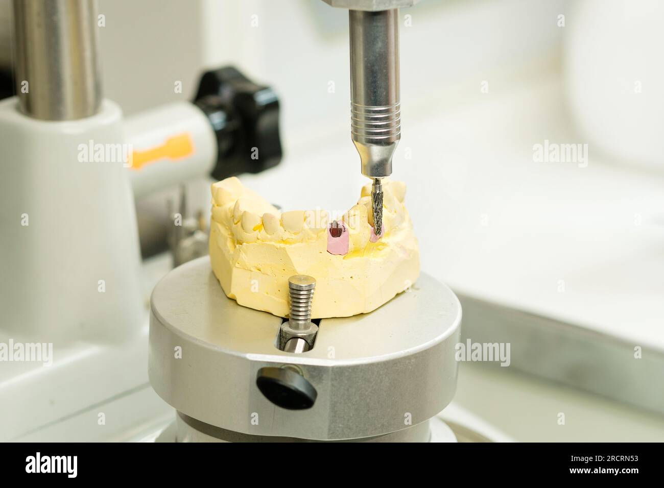 Manufacturing of dental crowns and dentures. Crown milling on High