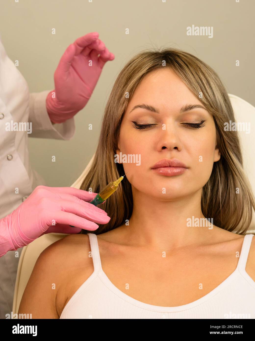 Esthetician Uses Thin Needle To Inject Platelet Rich Plasma In Skin Face Female Customer Plasma