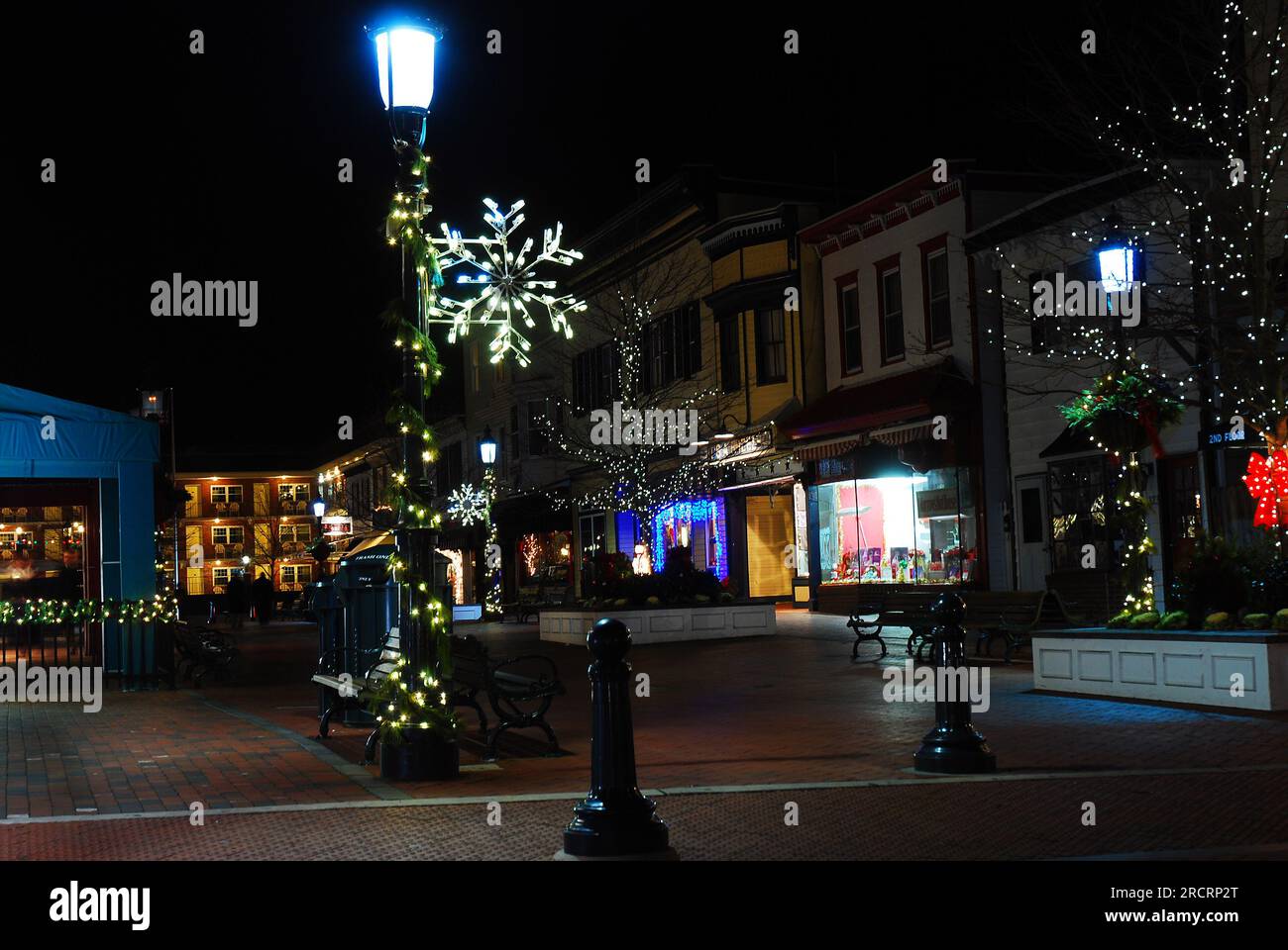 Christmas decorations lighten an outdoor mall and retail shopping area