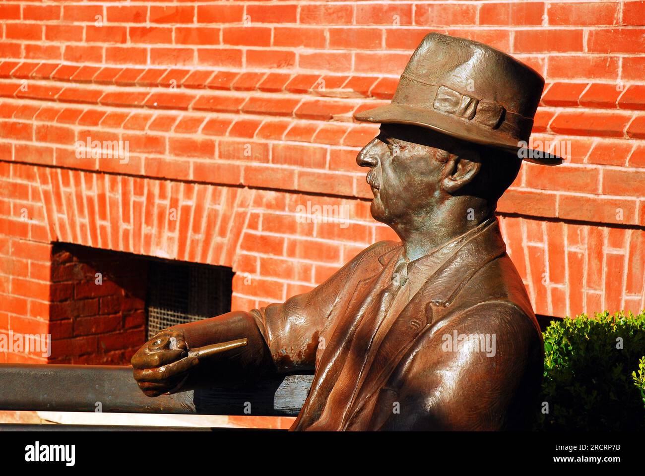 A sculpture of author William Faulkner stands on the main square in his Oxford, Mississippi town, near the City Hall Stock Photo