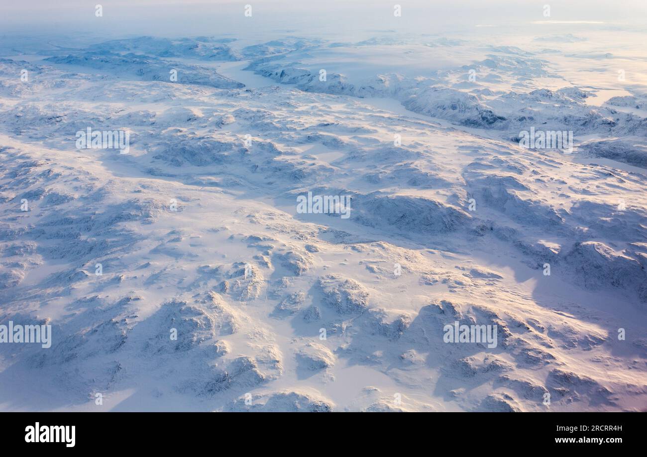 Greenlandic ice cap with frozen mountains and fjords aerial view, near Nuuk, Greenland Stock Photo