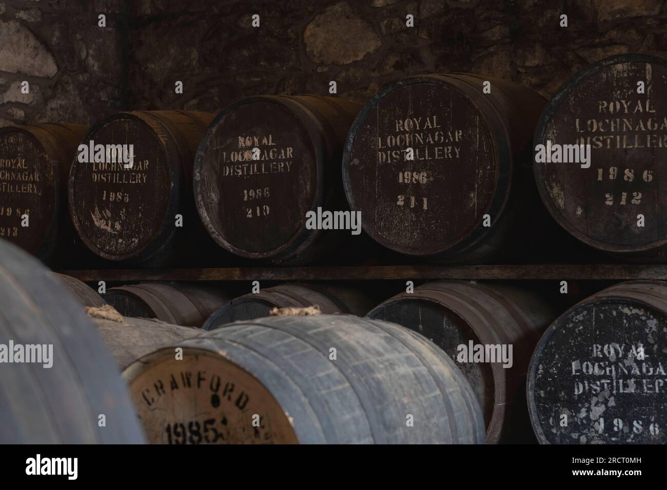 Whisky Casks, or Barrels, Stored in the Duty Paid Warehouse at the Royal Lochnagar Distillery in the Highlands Near Balmoral Castle Stock Photo