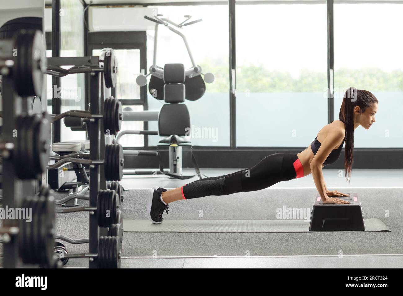 Woman Push-ups On The Floor At The Gym Stock Photo, Picture and Royalty  Free Image. Image 40338273.
