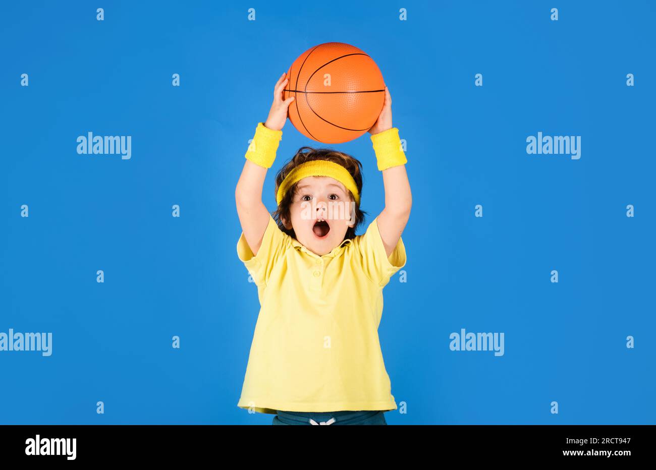 Active sport lifestyle. Basketball game. Little sporty kid throwing